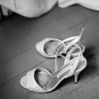 The bride's shoes set on the floor