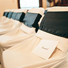 Detail image of the chairs set up for a wedding ceremony