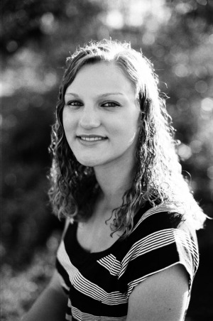 Senior portrait of a young woman at the park