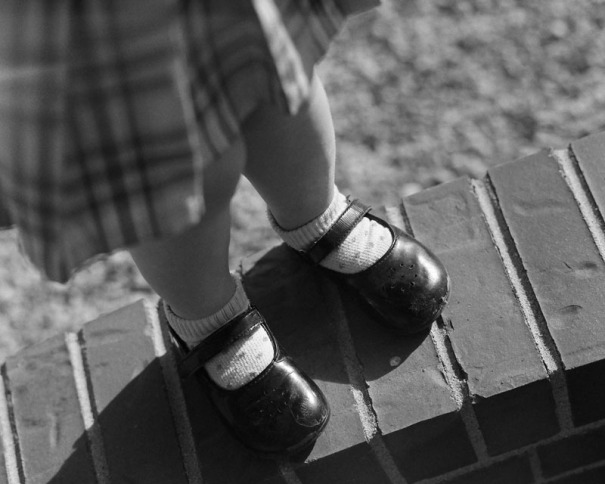 Two year old girl's worn out shoes