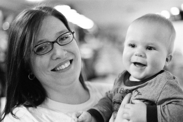 A woman and her nephew smile for the camera