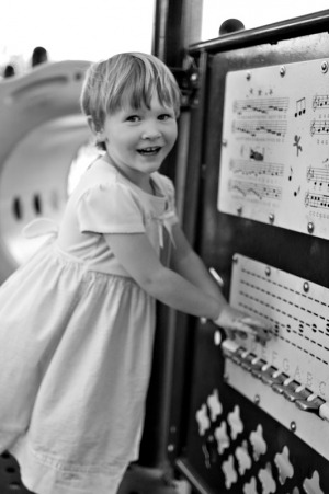 Three year old girl playing a