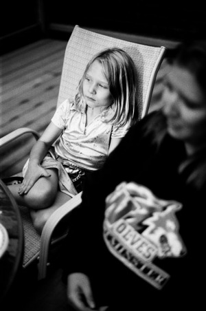 Six year old girl sitting in a deck chair