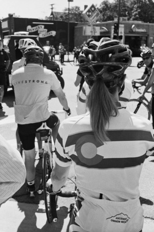 Cyclists in Livestrong and Colorado jerseys