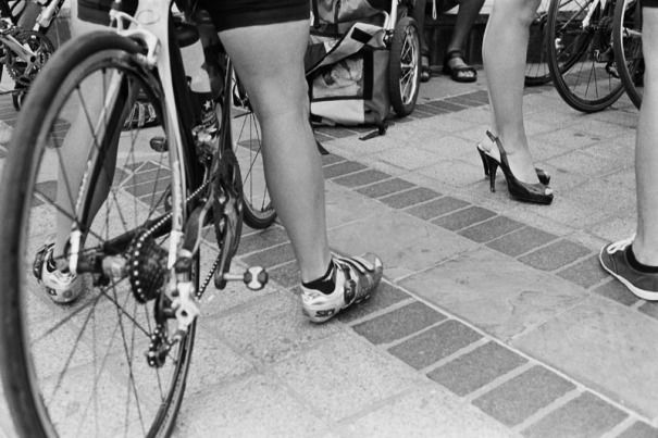 Cycling shoes and high heels. Photograph from the press conference announcing the Quiznos Pro Challenge, in Denver, CO on August 4th, 2010.