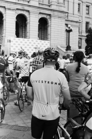 Cyclist in a Livestrong jersey at the state capitol for the press conference announcing the Quiznos Pro Challenge, in Denver, CO on August 4th, 2010.