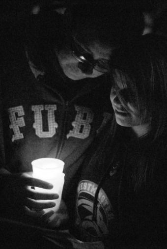 Students huddle together