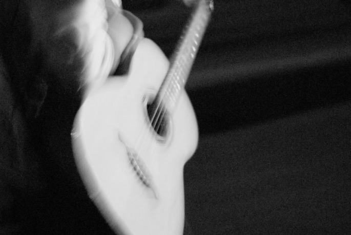 Students play guitars