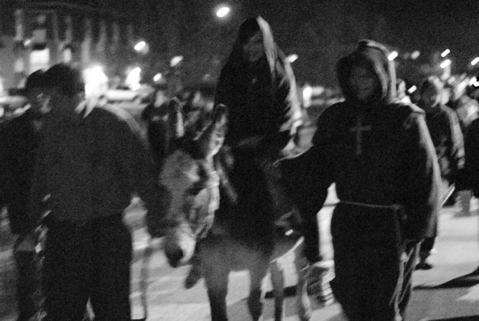 Two students play the parts of Mary and Joseph