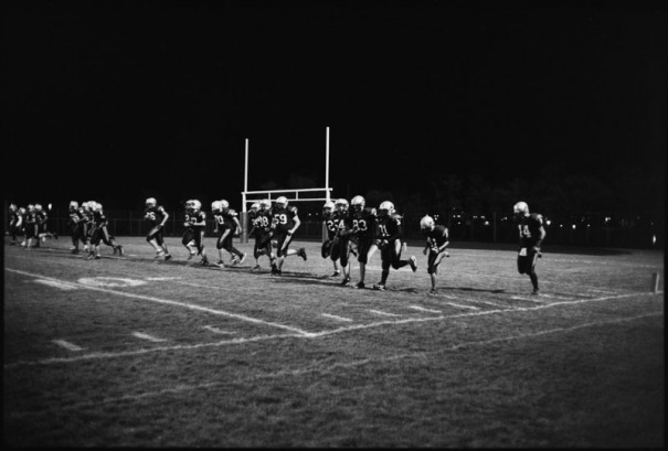 Football players warm up