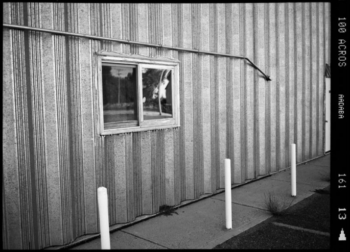 Large steel wall with a small window