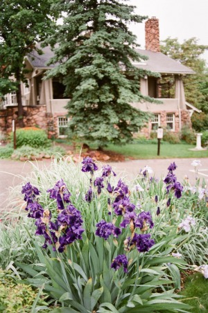 Flowers and the exterior of the Chautauqua Community House