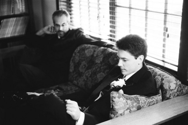 The Groom and Pastor share a quite moment