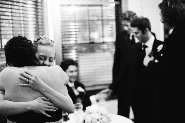 The Bride hugs one of her bridesmaids