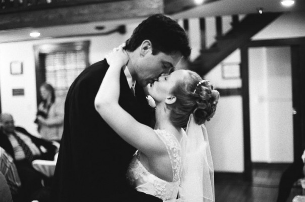 The Bride and Groom share a kiss