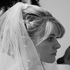 Profile view of a bride in her veil