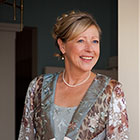 Mother of the groom smiles