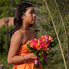 Maid of Honor holds the Bride's bouquet