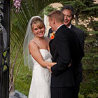 Bride smiles at her guests