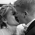 Bride and Groom share a kiss