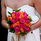 Bride holding her colorful bouquet