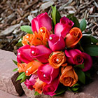 Brides bouquet and wine bottle